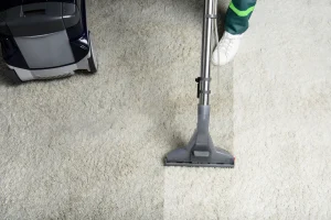 Commercial carpet cleaning technician cleaning office carpet in Winnipeg building